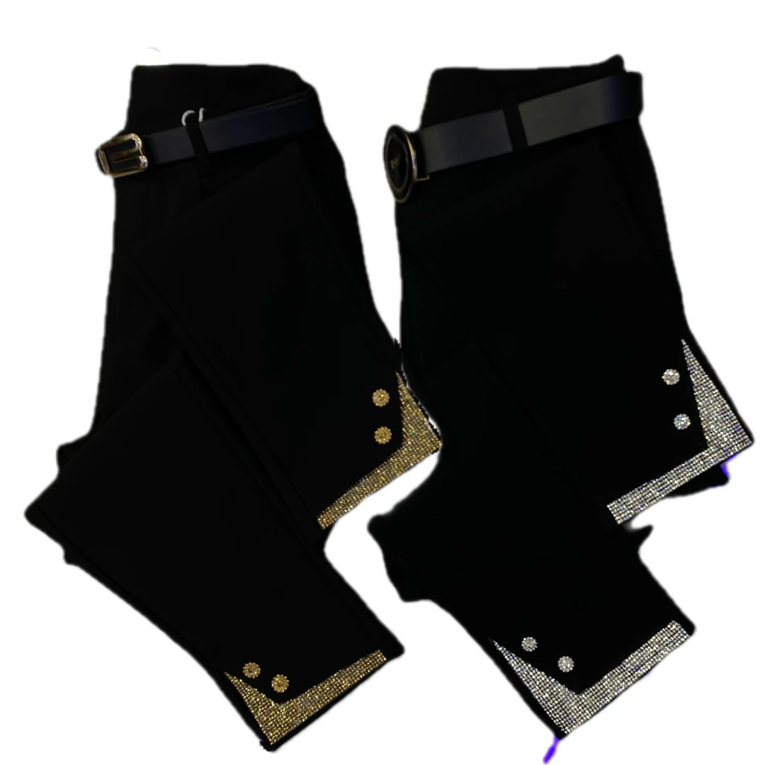 2002款春季新款重工裤脚边烫钻修身显瘦小脚裤