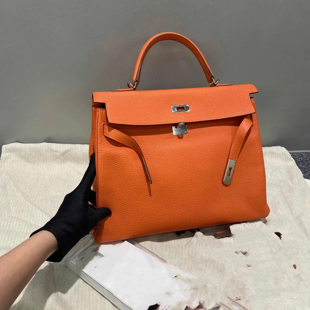 95新 Hermes/爱马仕 小花攀攀Kelly 35 橘色 框N 包