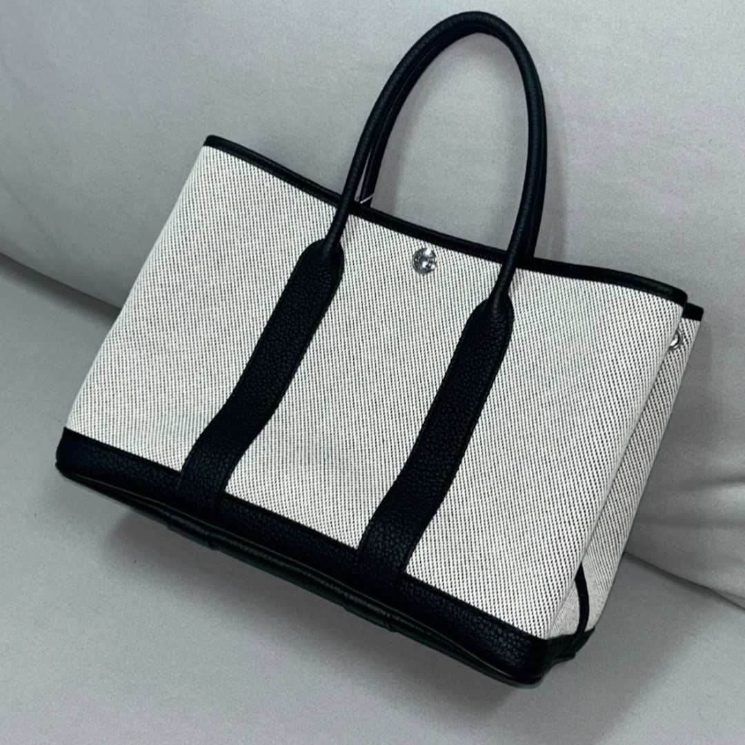 95新 Hermes/爱马仕 小花姑姑 黑色拼帆布 圈L刻 手提包