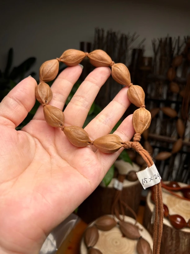 梅林铁核三面佛1.5X2.3的橄榄核素核素串原料