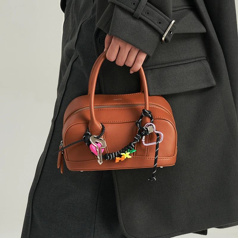 HXXXXS设计师款真皮大容量手提保龄球包女式高级感通勤日常女包