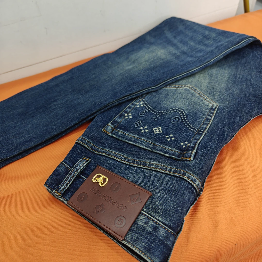 秋冬新款高端欧货深蓝色男装印花男士牛仔裤修身爆款小脚水洗男裤