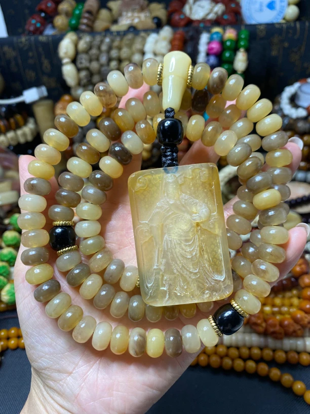 非金属皮质手链 蜜色羊角脖挂链
