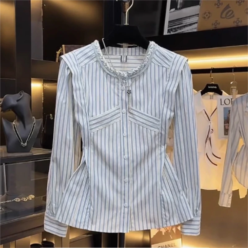 春季女装2025新款时尚气质条纹压褶收腰显瘦设计修身长袖衬衫上衣