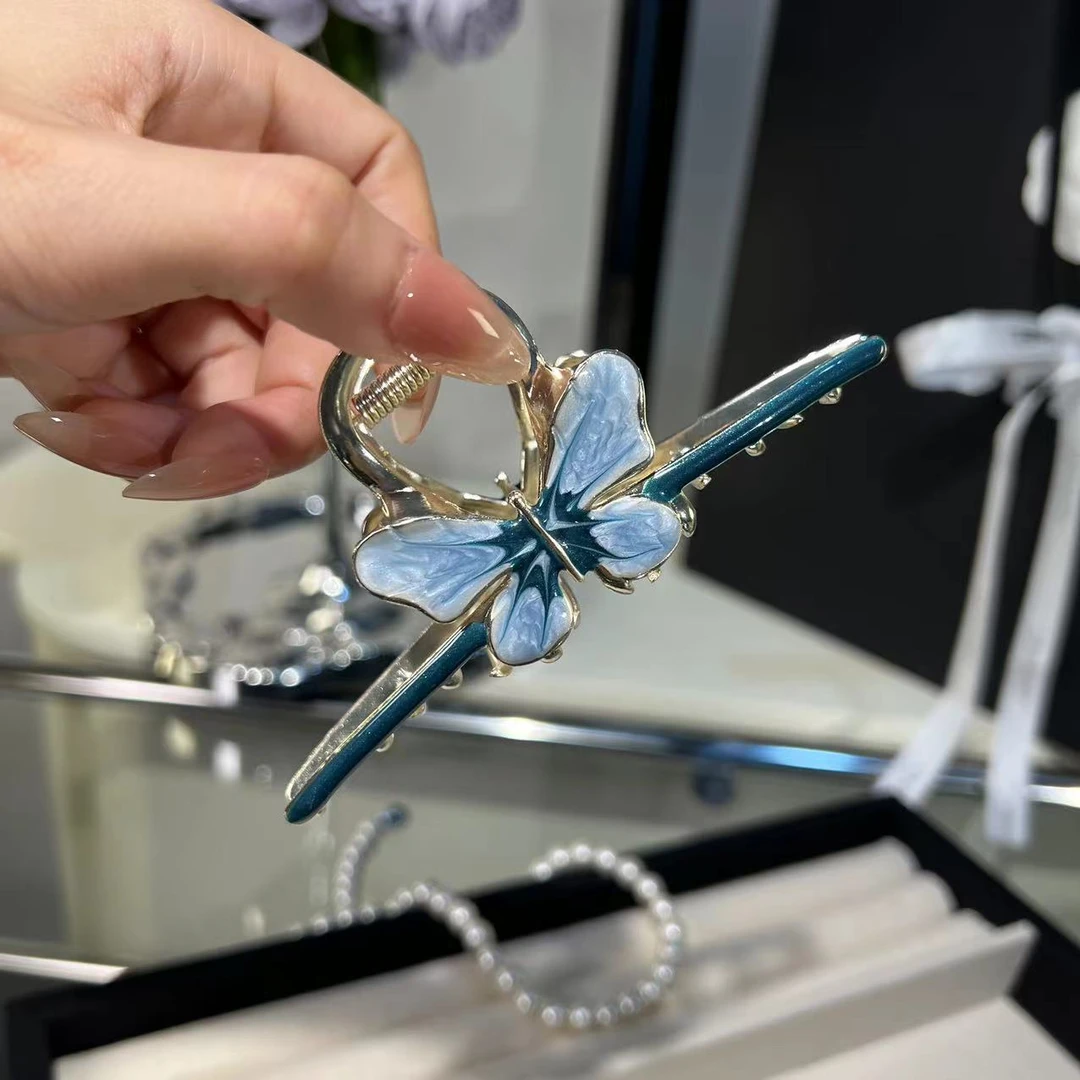 A012【满9.9包邮】新款超仙蝴蝶金属滴油发夹少女后脑勺盘发抓夹