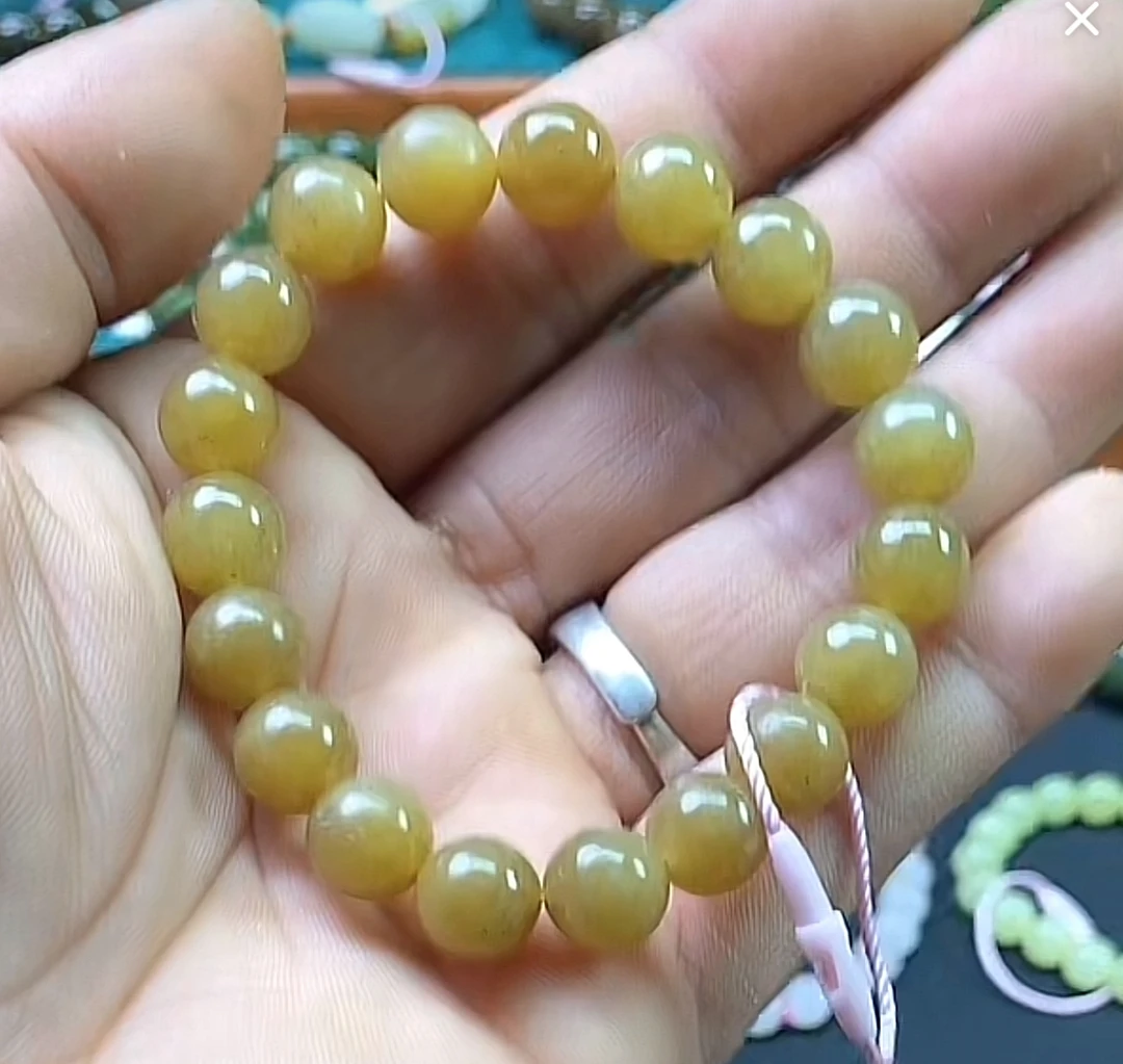 020新疆和田玉精品黄金糖卡10的圆珠手串