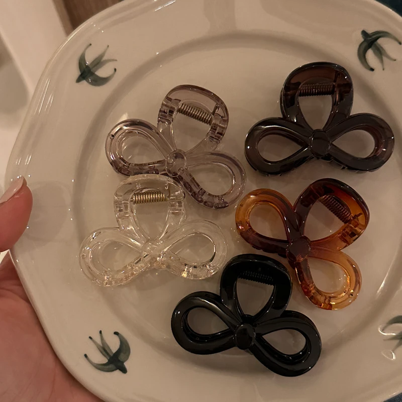 气质款~夏季简约设计蝴蝶结抓夹冰透纯色后脑勺盘发鲨鱼夹发饰