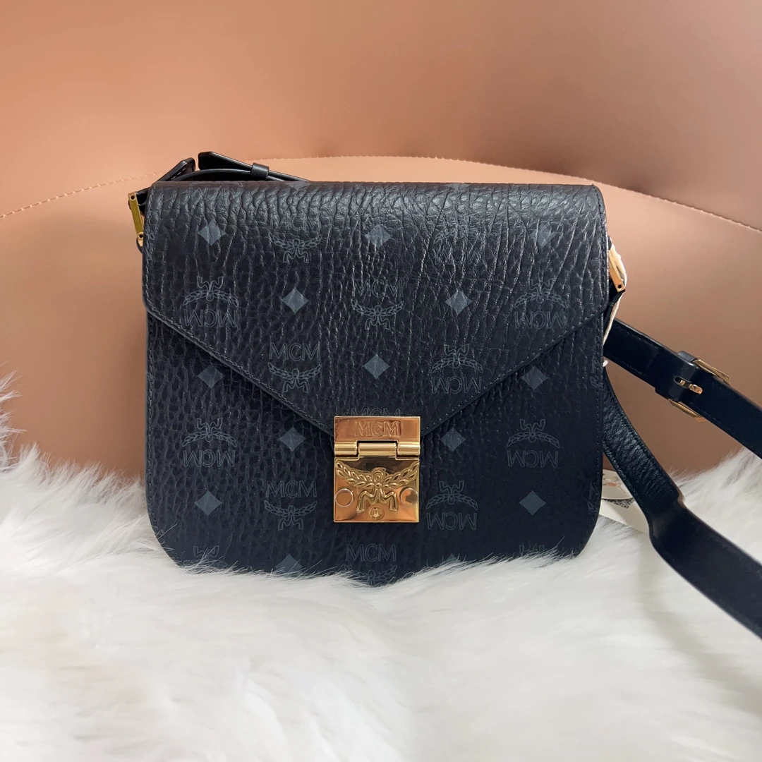 95新 MCM MCM黑色B0251马鞍邮差包