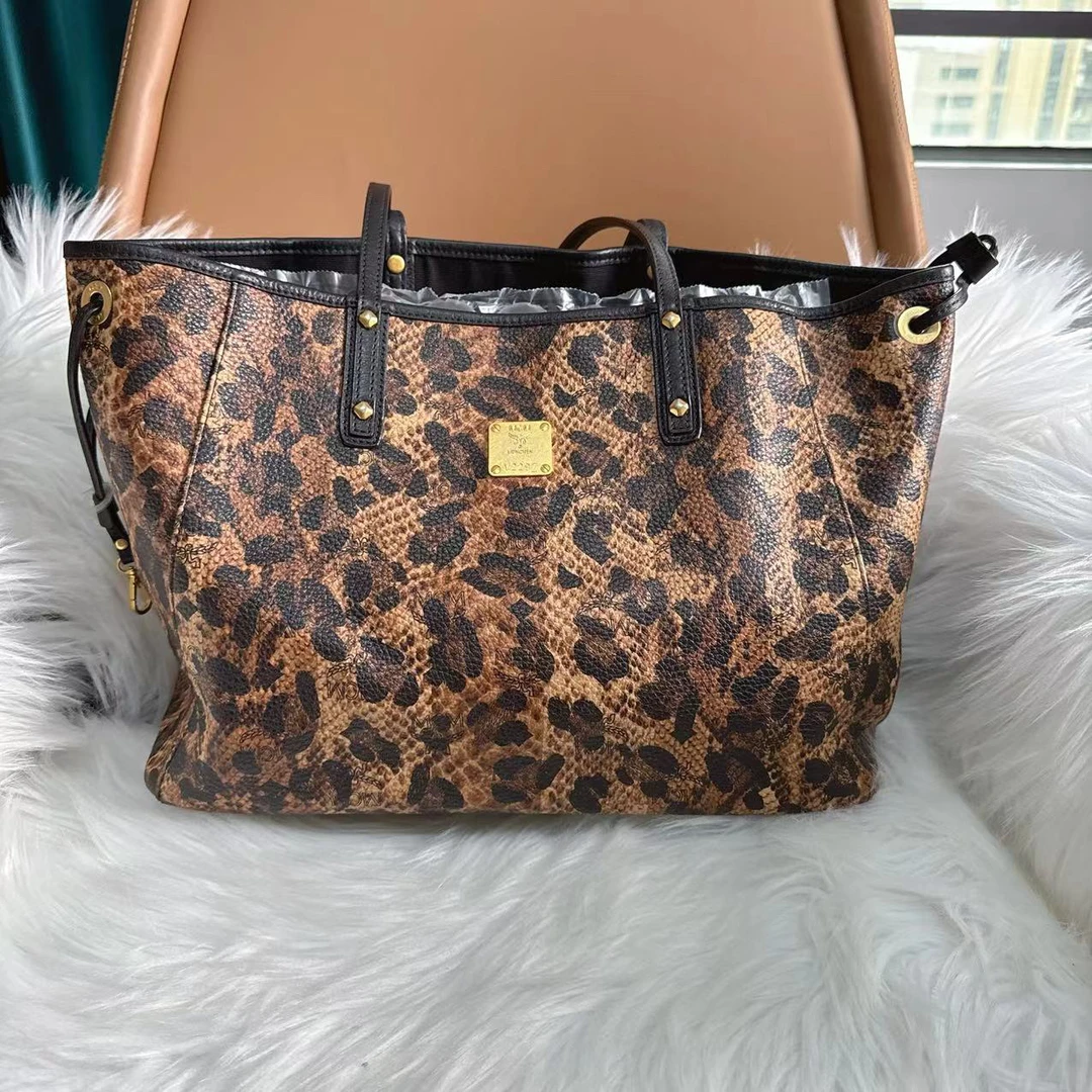 95新 MCM MCM稀有皮咖色百搭款手提包