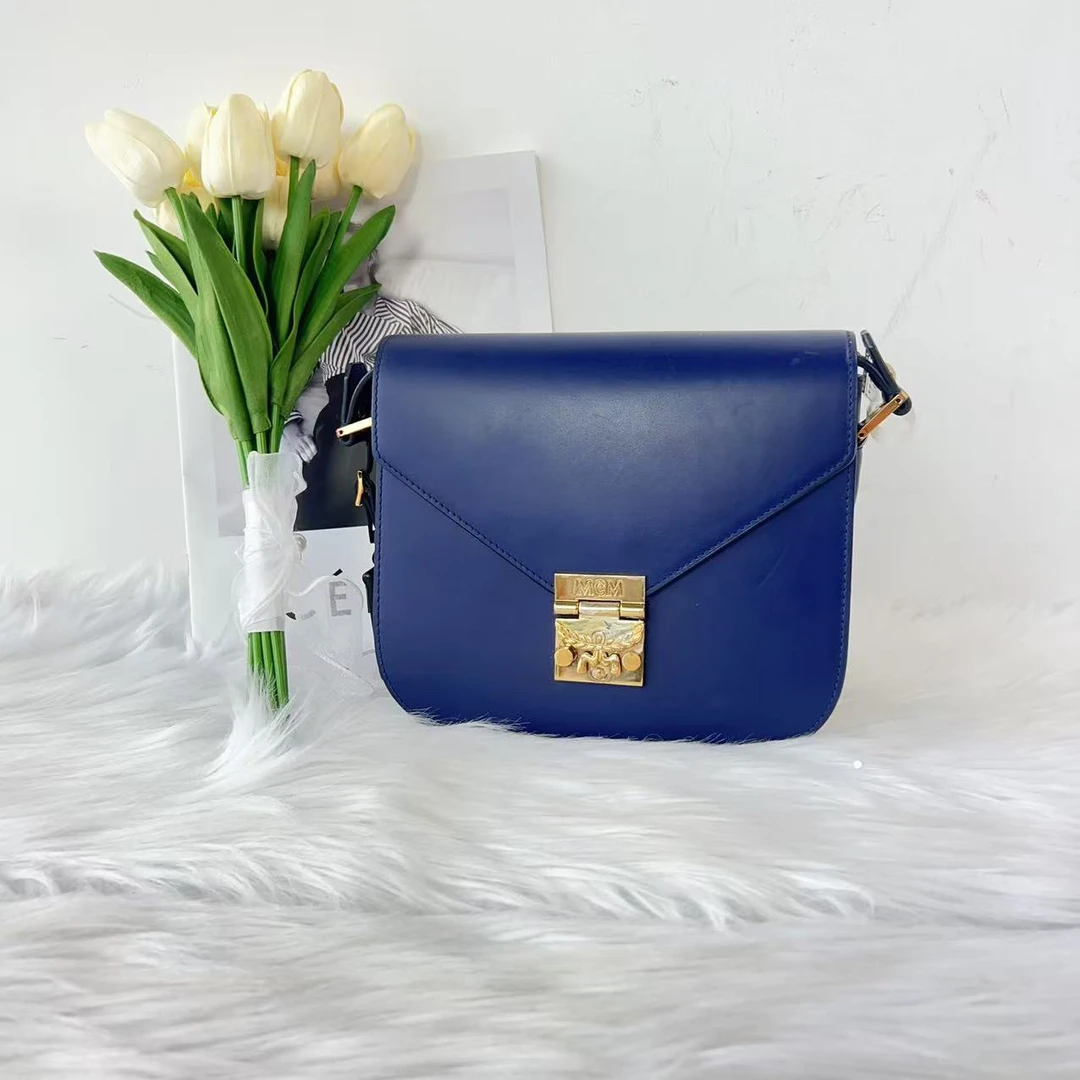 95新 MCM mcm 百搭款蓝色马鞍单肩包B0751