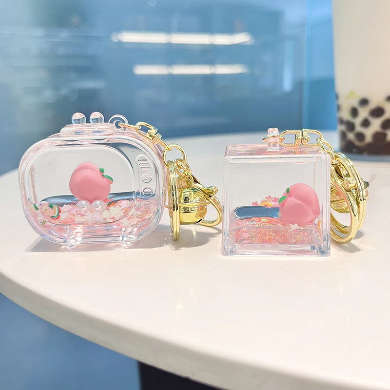 少女心粉色水蜜桃流沙液体漂浮钥匙扣可爱精致书包汽车挂件小礼品