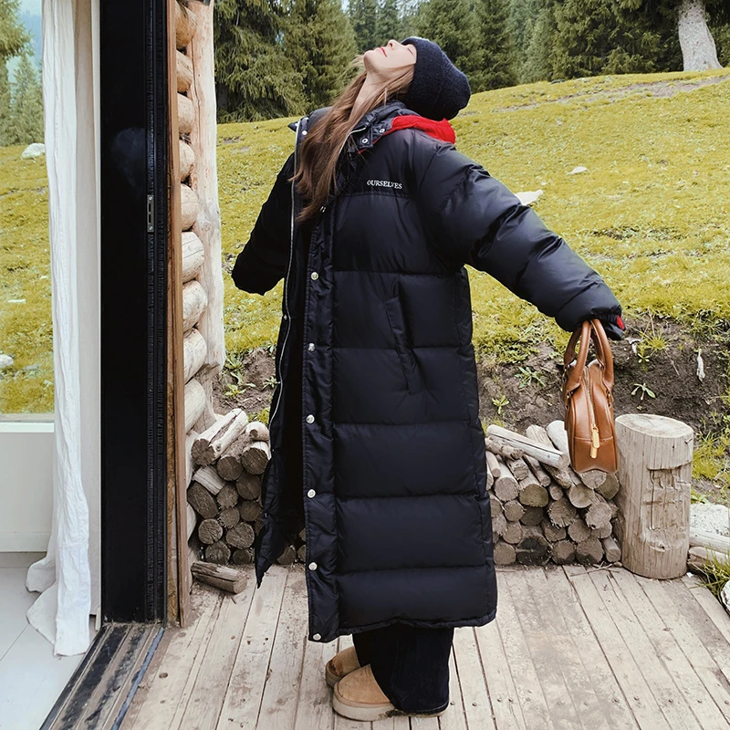 黑色连帽面包服羽绒服女冬季2024新款设计感长款保暖白鸭绒厚外套