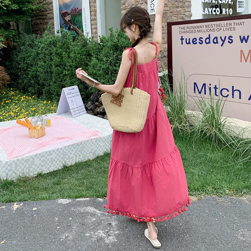 玫粉色流苏夏季吊带连衣裙女洋气法式新款度假气质显瘦长裙微胖
