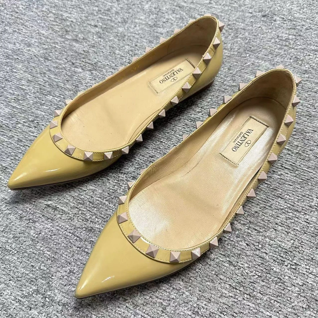 Valentino/华伦天奴诺曼女鞋折扣橘黄色铆钉尖头平底鞋36码 1311