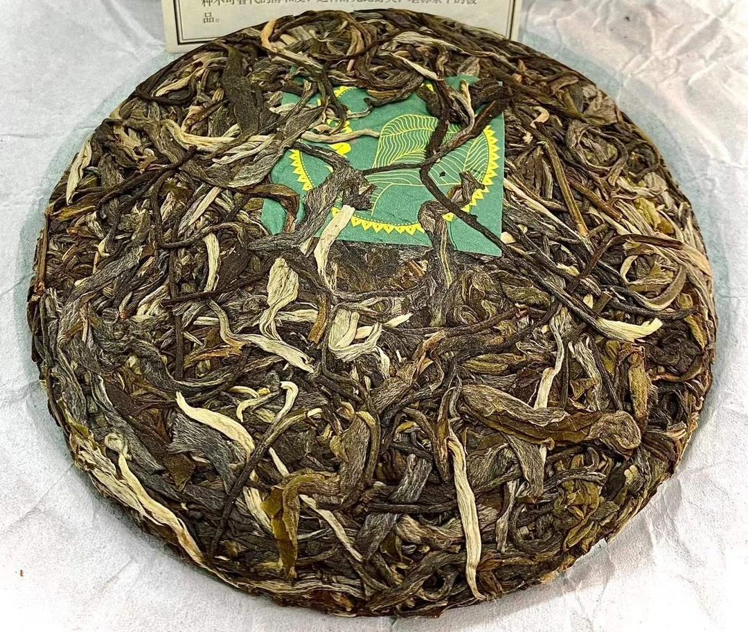 弯弓200克 饼茶 云南普洱茶生茶