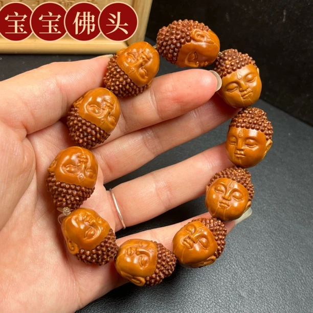 铁核老料宝宝佛头橄榄核雕手串文玩