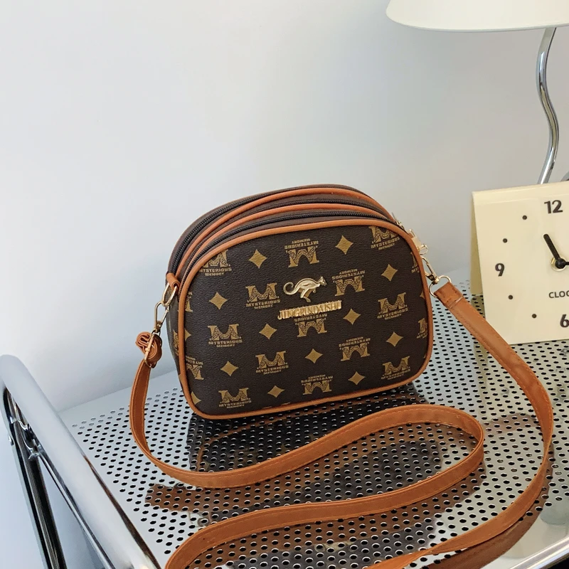 KAKA2024新款韩版个性印花女士时尚大容量斜挎包小圆包单肩手机包