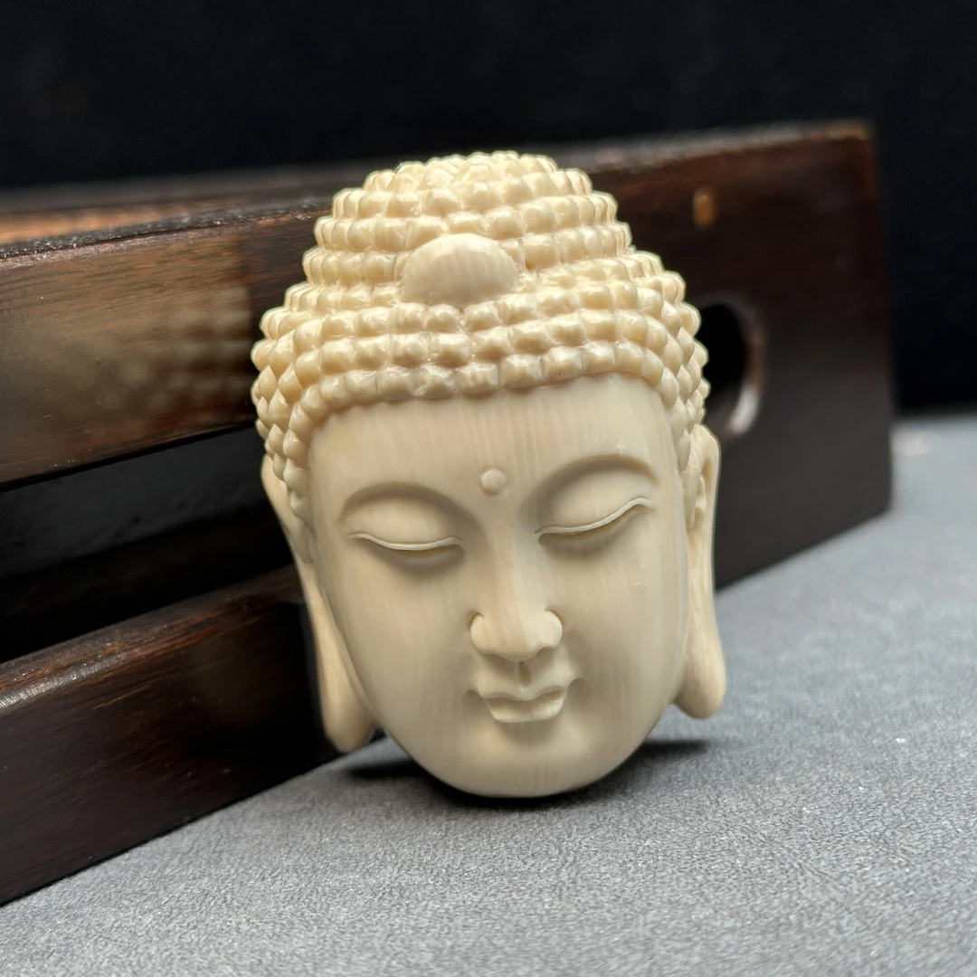H3013 天然猛犸牙 雕刻佛头 37.8*52*26.9mm支持鉴定 假一罚四
