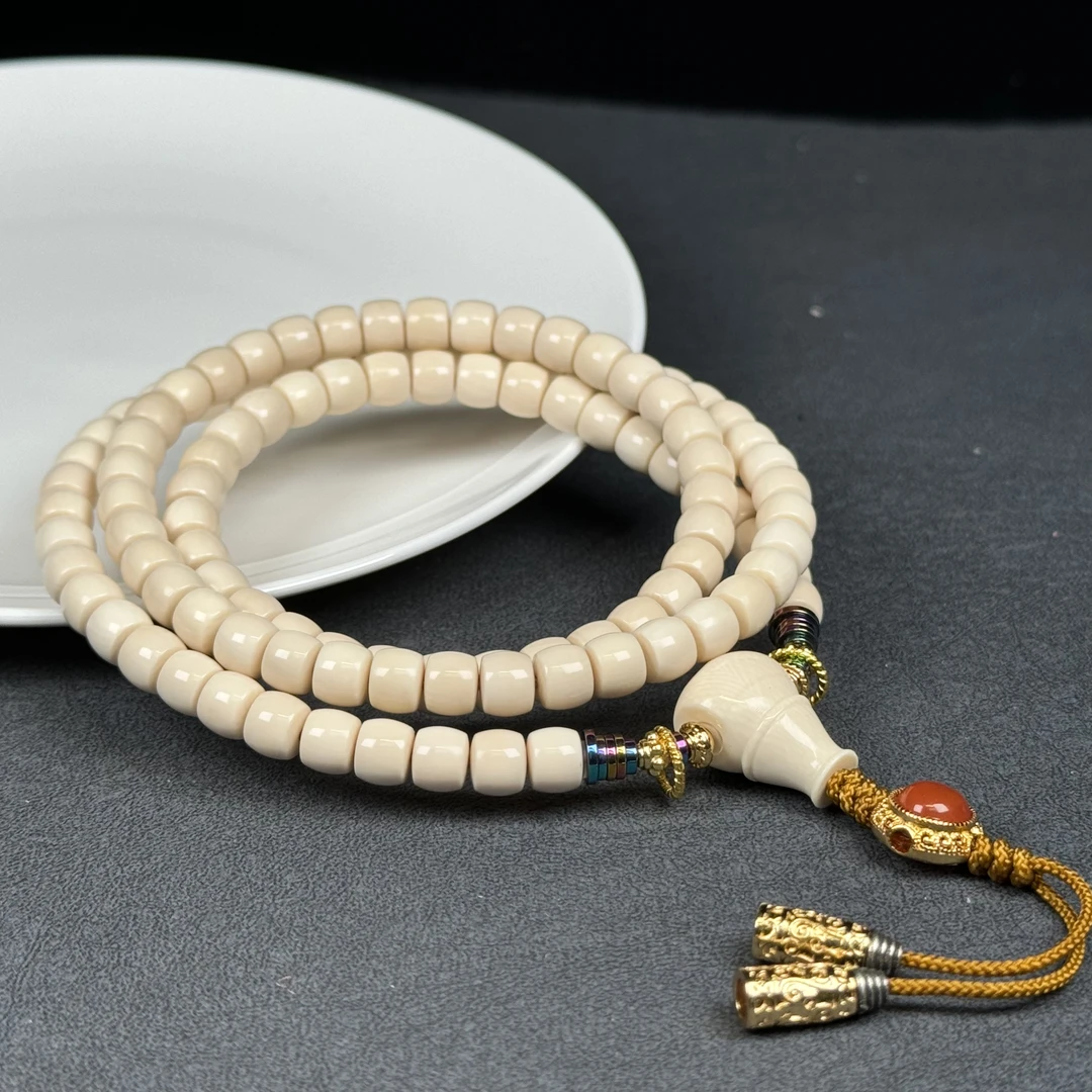 Q4607天然猛犸牙 108挂脖 7*6mm支持鉴定 假一罚四