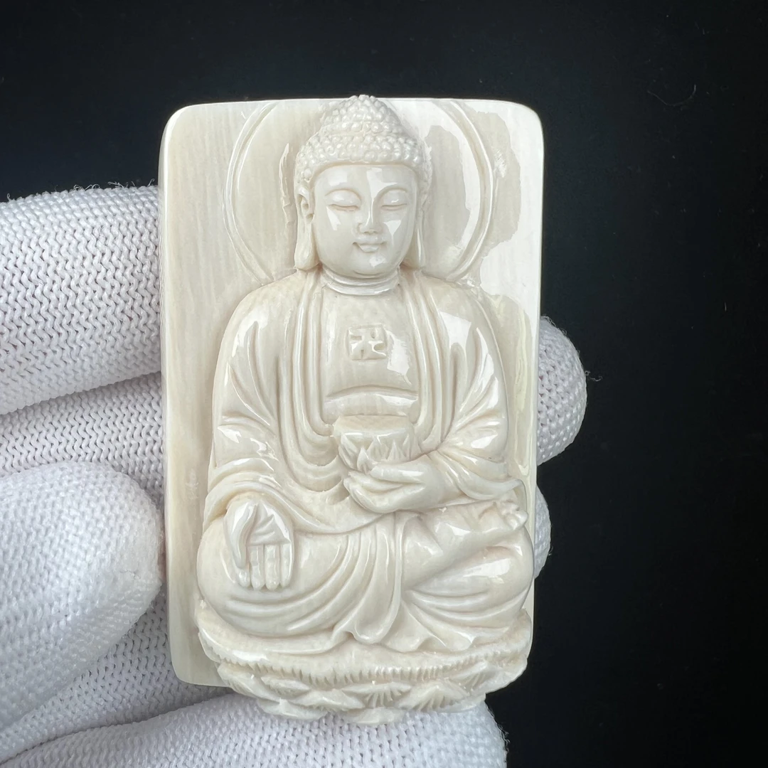 K5192天然猛犸牙 雕刻大日如来 34*51*17mm支持鉴定 假一罚四