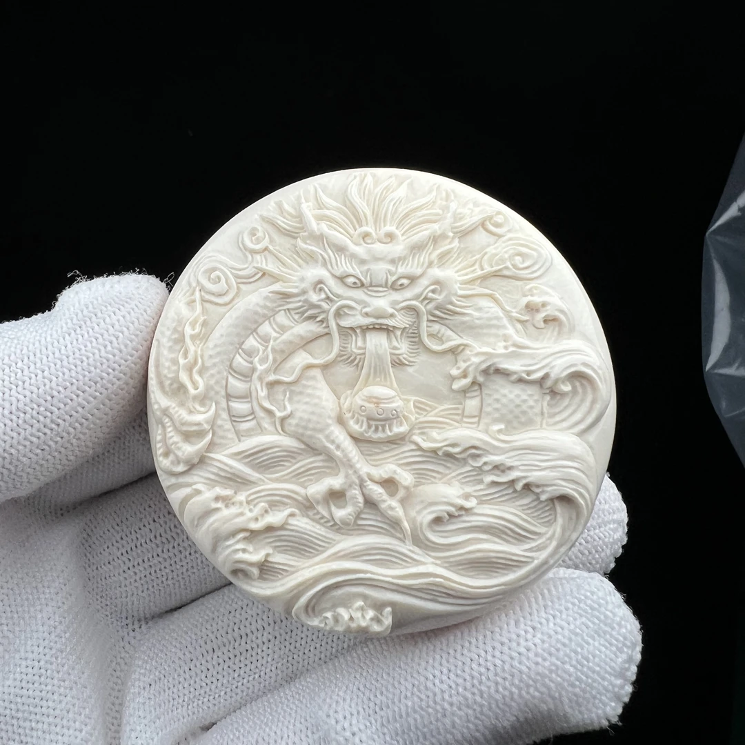 H1921天然猛犸牙 雕刻龙饼 53*21mm支持鉴定 假一罚四