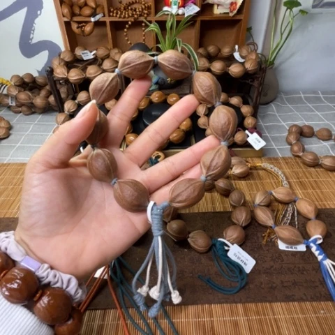 橄榄核核雕虎*营梅林铁核21.30
