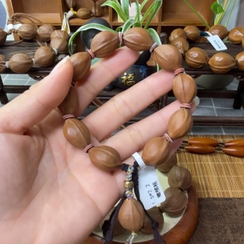 橄榄核核雕梅林铁核15.22