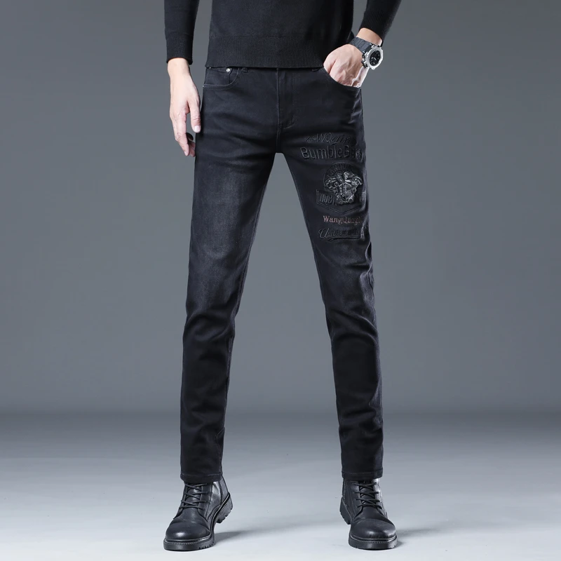 秋冬厚款黑色刺绣小美人欧货男士修身小脚高端弹力牛仔裤休闲853