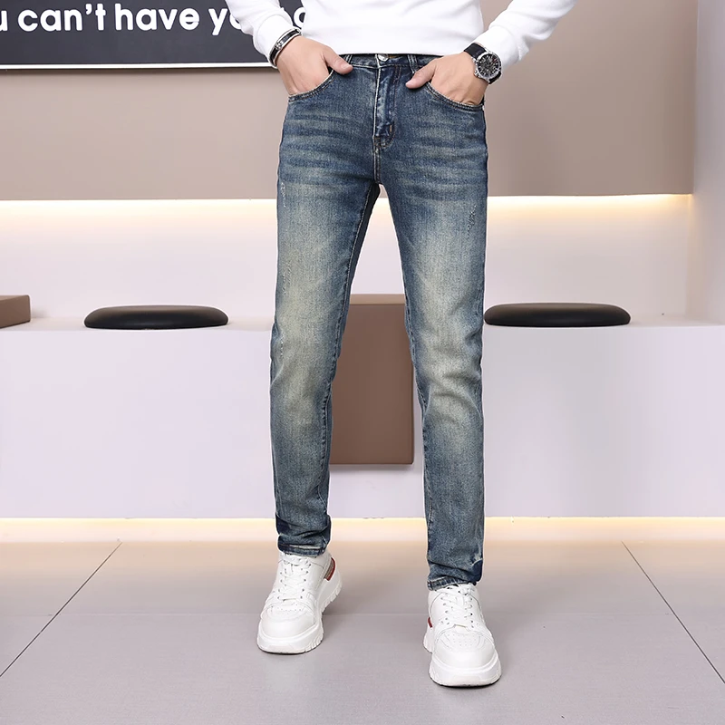 秋季新款男士牛仔裤潮牌休闲简约蓝色修身裤子小脚长裤男91333
