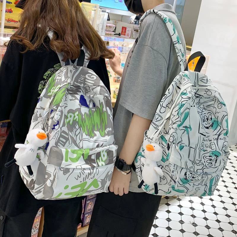 涂鸦印花双肩包女2024新款夏韩版潮流休闲背包男高中大学生书包女