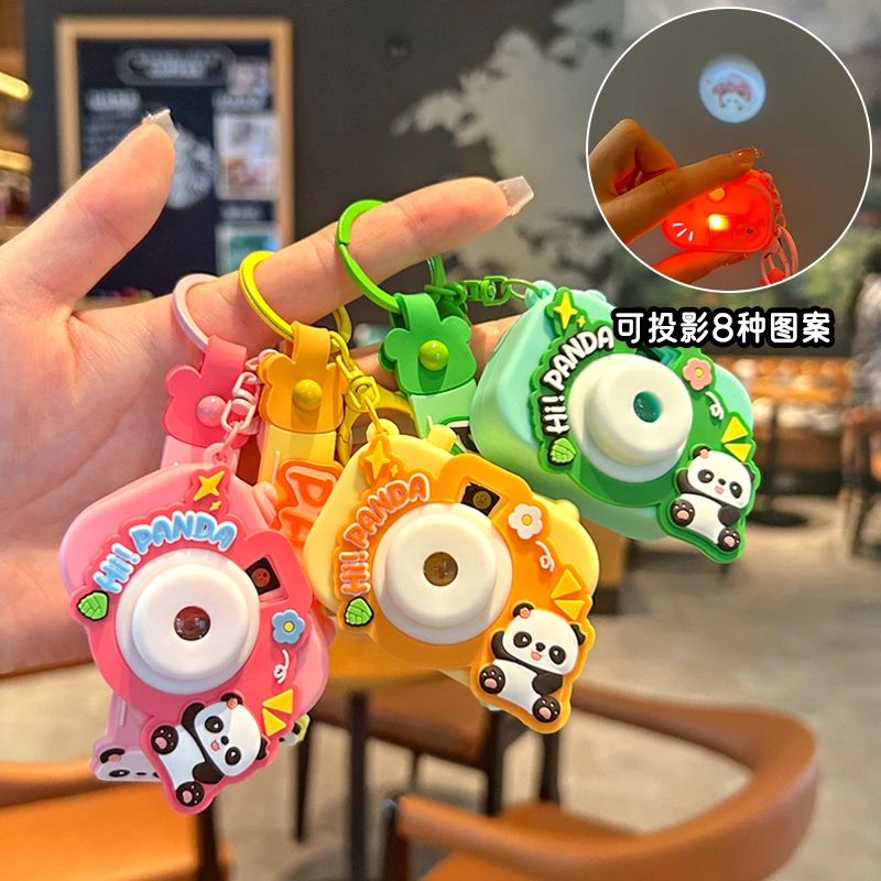 2024年新款熊猫投影相机钥匙扣男女学生书包挂件饰品车钥匙链挂饰