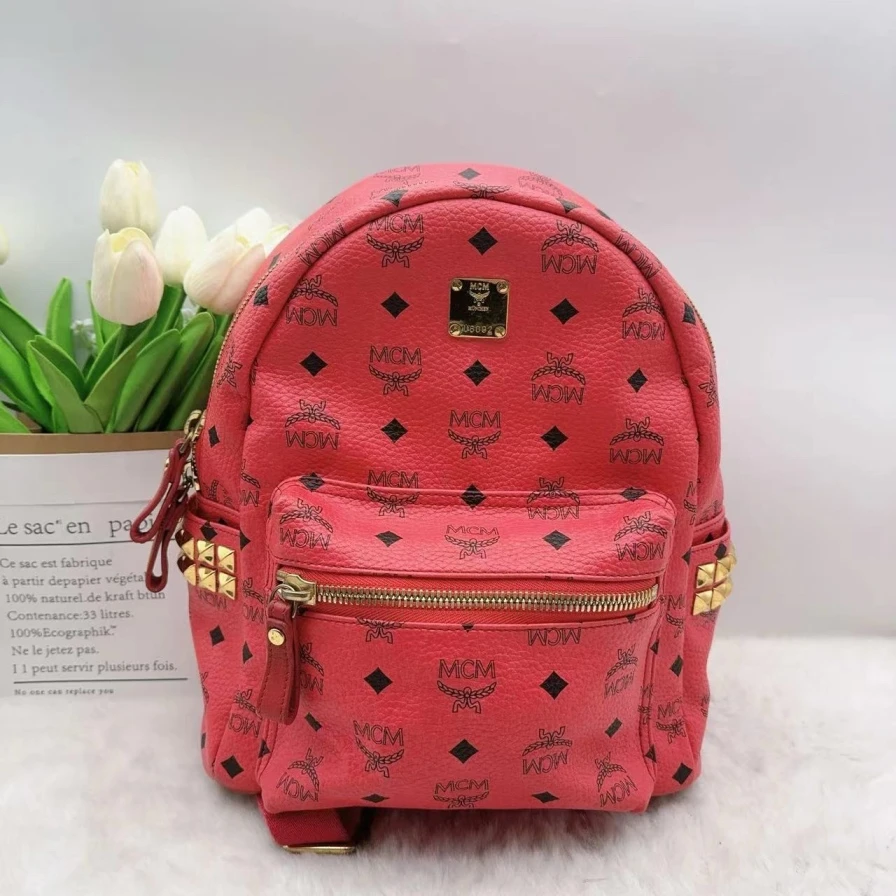 95新 MCM  玫粉色双肩背包 888 1057