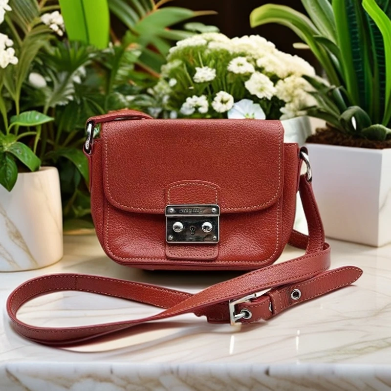 95新 MIU MIU/缪缪 橙色单肩包 958 6447