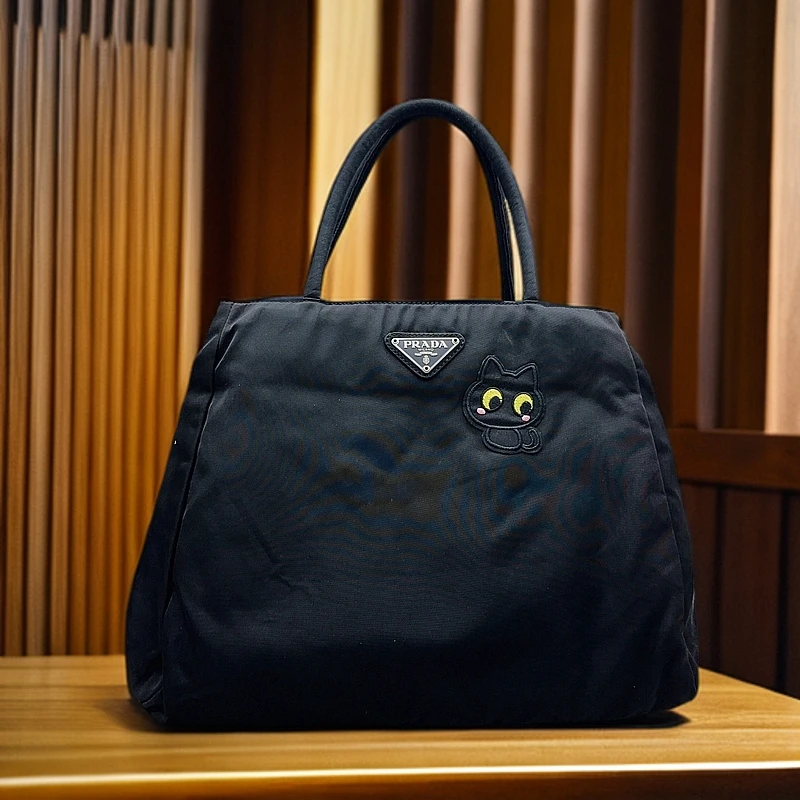 95新 Prada/普拉达 黑色小猫手提单肩包 1092 3364