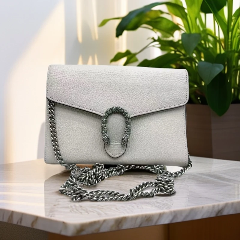 95新 GUCCI/古驰  白色钻扣酒神   1062 9128