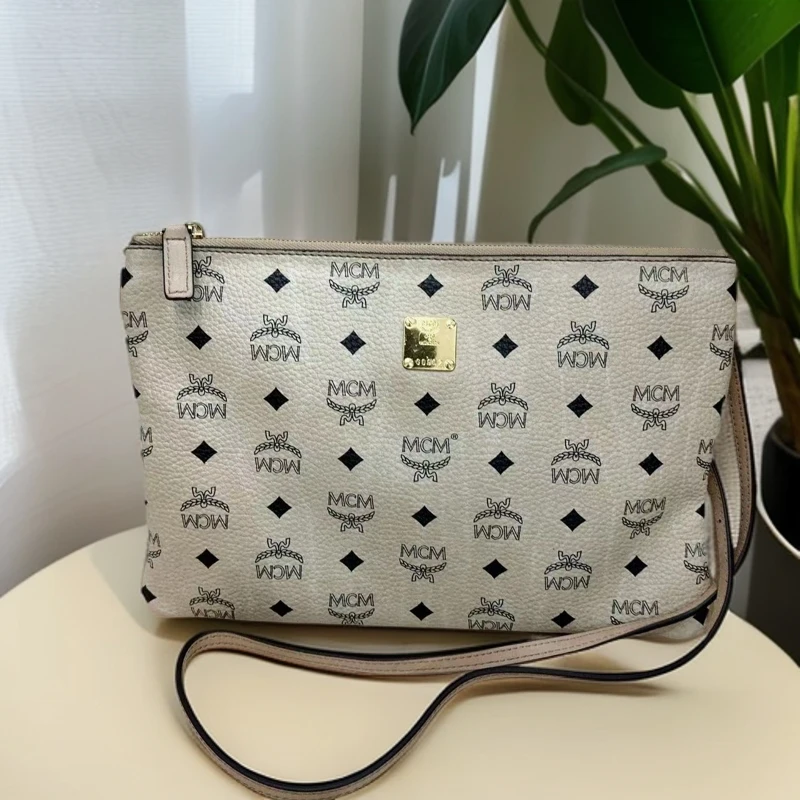 95新 MCM  老花斜挎包 948 5244