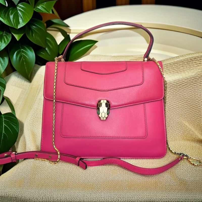 95新 BVLGARI/宝格丽  粉色蛇头手提包 1028 1282