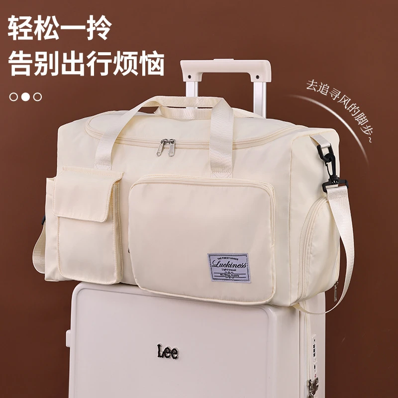 新款大容量短期旅游旅行包女款手提包防水行李包可套行李袋女包包