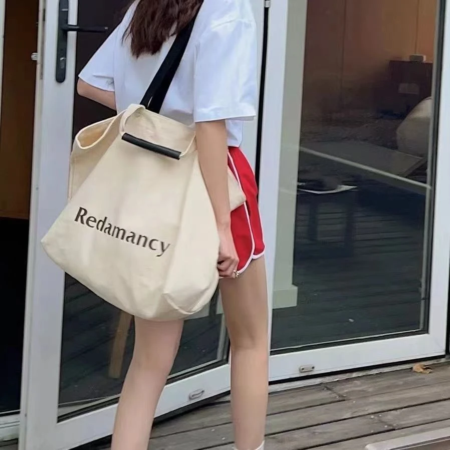 慵懒大牌休闲百搭通勤帆布包女大容量单肩包手提托特包学生拎书袋