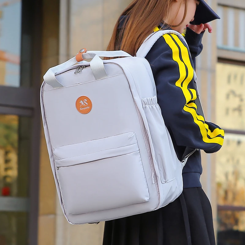 张张定制旅行双肩包高品质学生书包男女士双肩百搭便捷甜甜圈