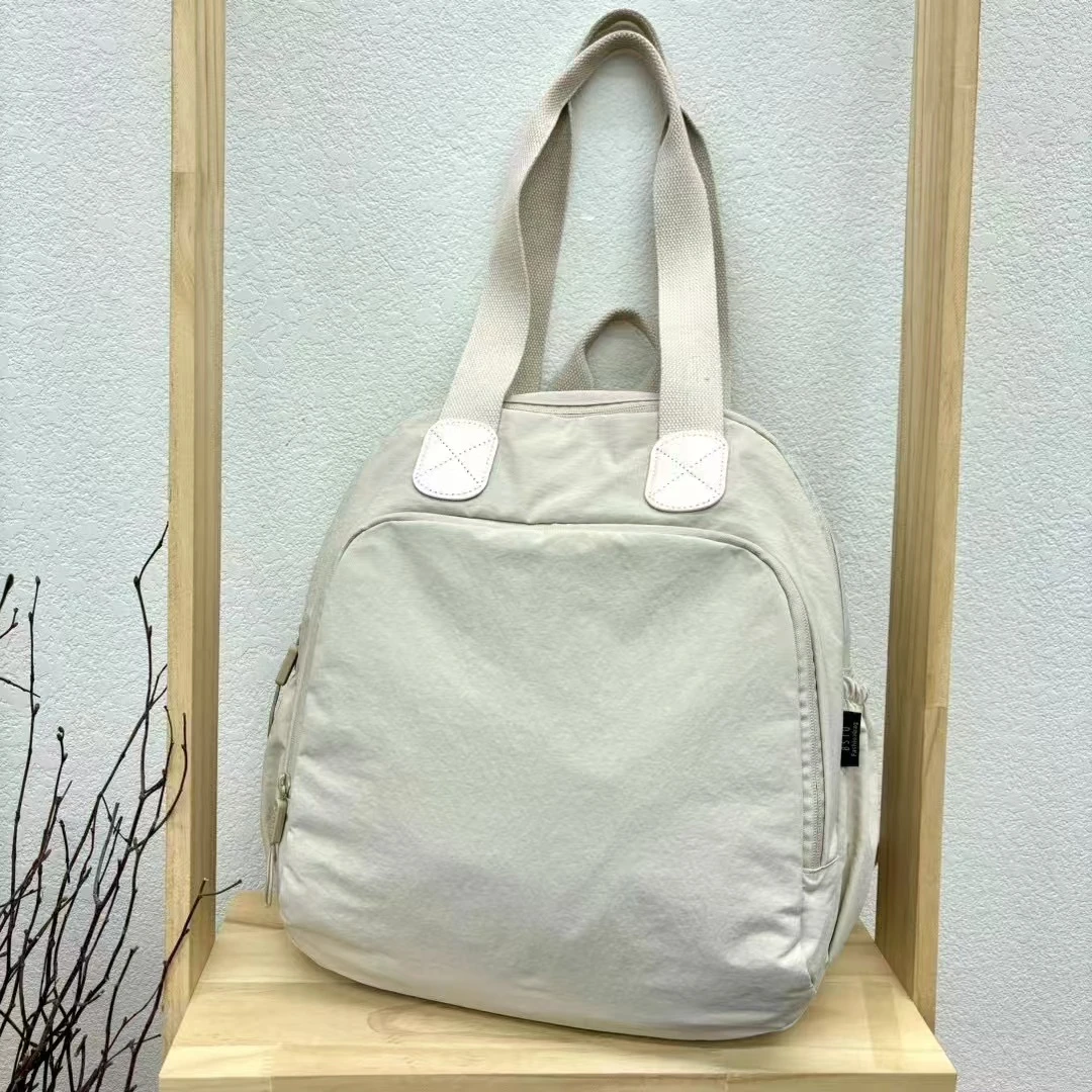 新款手提双肩大容量时尚休闲潮流简约百搭女士便携轻便休闲包