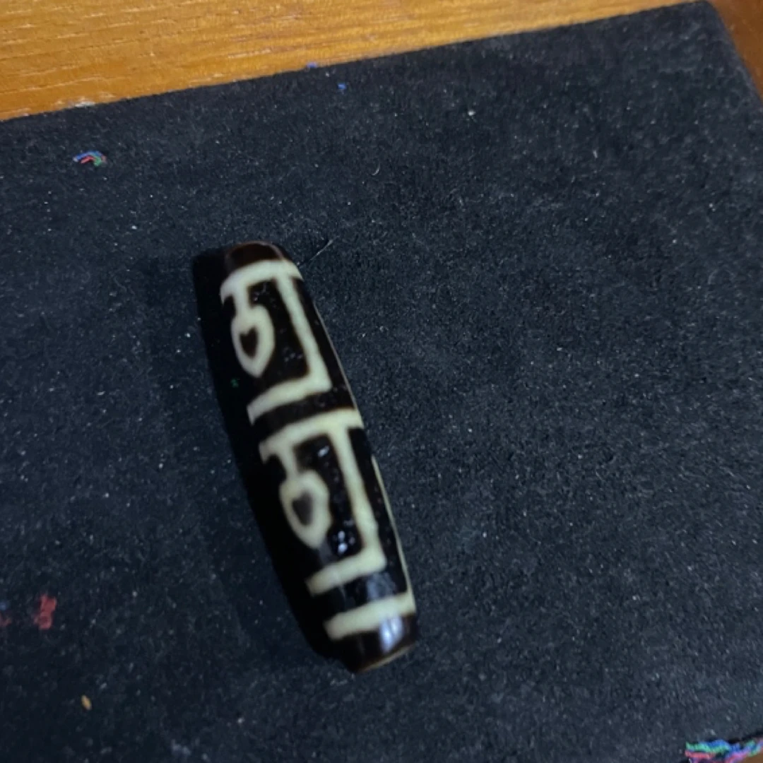 张奎佛心4眼玛瑙吊坠