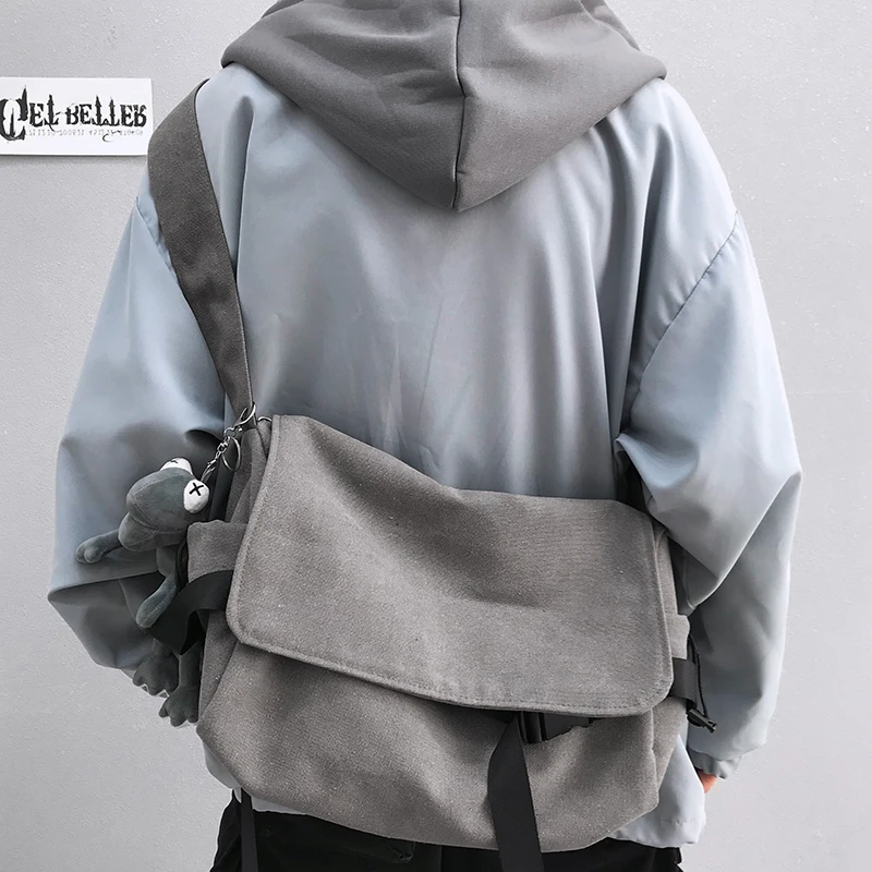 男女同款斜挎包ins潮牌复古新款慵懒休闲包包帆布邮差包单肩包