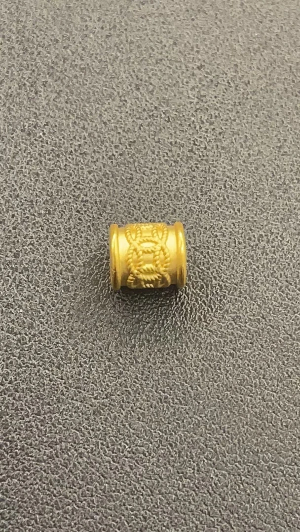 足金999 素钱币纹中穿桶珠   0.98