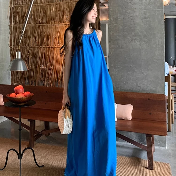 法式克莱因蓝色挂脖吊带连衣裙女夏季高级感海边度假流苏沙滩长裙