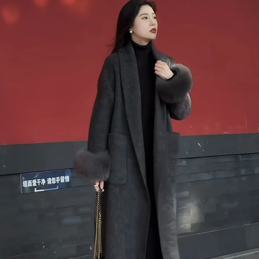 羽绒气质大衣女2025新款羽绒服显瘦毛呢长款过冬外套时尚设计师