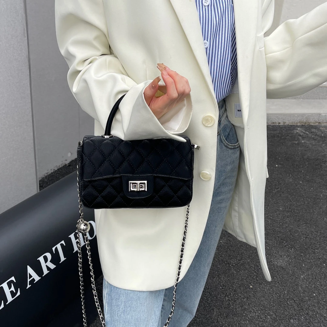 【芝麻集】ZT-D8585-黑色RAIN.CUN夏季新款腋下斜跨轻奢女包