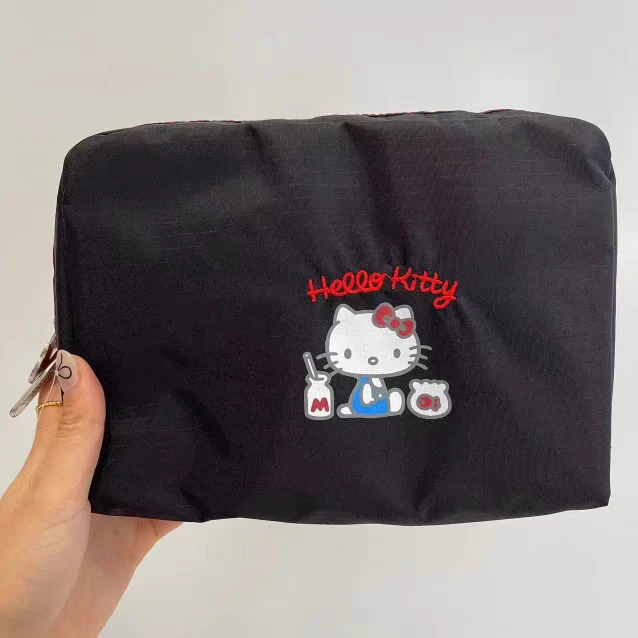 k023新品黑色卡通kt猫可爱女包手拿收纳包手拿包