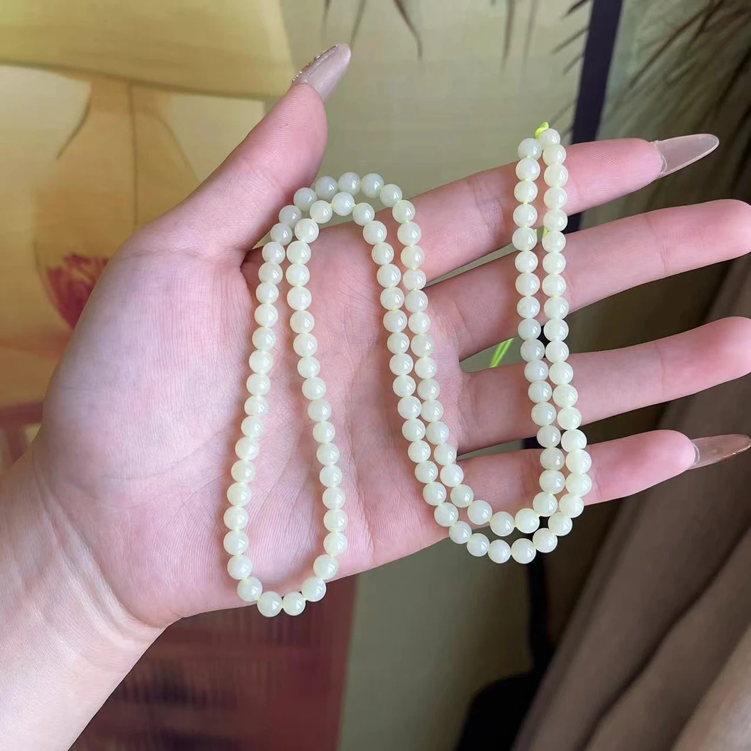 SC9802  和田玉黄口料长链108颗