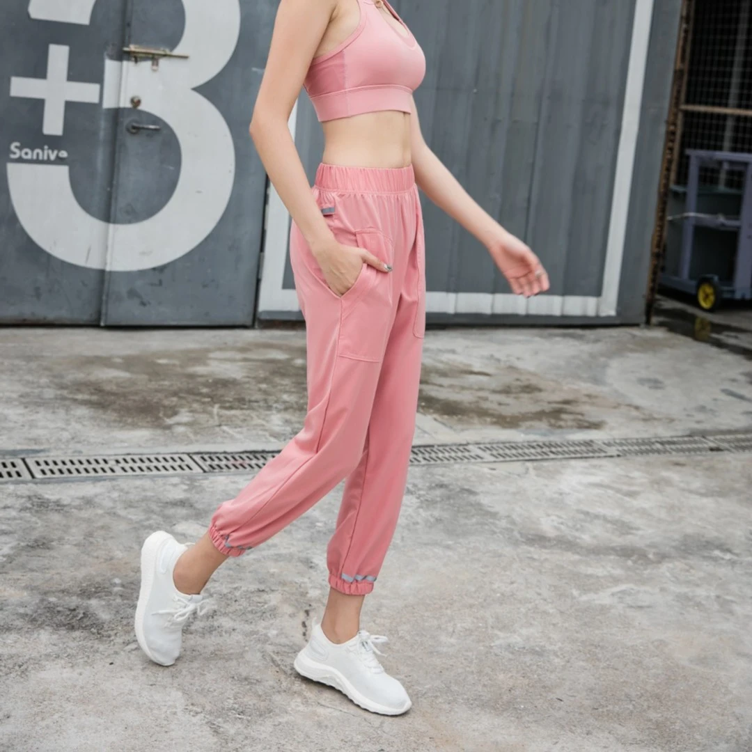 【0023宽松显瘦】运动时尚显瘦斜袋反光梭织长裤户外健身透气休闲裤